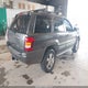 1J8GW68J73C519765 2003 Jeep Grand Cherokee Overland auction photo thumbnail 4