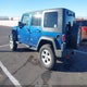1J4HA3H18AL166551 2010 Jeep Wrangler Unlimited Sport auction photo thumbnail 3