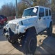 1C4BJWEG2FL524367 2015 Jeep Wrangler Unlimited Sahara auction photo thumbnail 2