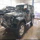1J4FA541X9L763737 2009 Jeep Wrangler Sahara auction photo thumbnail 2
