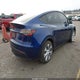 7SAYGDEE7PA103017 2023 Tesla Model Y Awd/Long Range Dual Motor All-Wheel Drive auction photo thumbnail 4