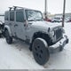 1C4BJWEG3FL703498 2015 Jeep Wrangler Unlimited Altitude auction photo thumbnail 1
