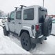 1C4BJWEG3FL703498 2015 Jeep Wrangler Unlimited Altitude auction photo thumbnail 3