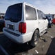 5LMPU28A5XLJ39215 1999 Lincoln Navigator auction photo thumbnail 4