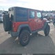1C4BJWDG7EL297838 2014 Jeep Wrangler Unlimited Sport auction photo thumbnail 4