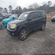 5FNYF3H65AB020758 2010 Honda Pilot Ex-L auction photo thumbnail 2