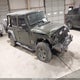 1C4BJWDG5FL740747 2015 Jeep Wrangler Unlimited Sport auction photo thumbnail 1
