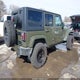 1C4BJWEG0GL145787 2016 Jeep Wrangler Unlimited Sahara auction photo thumbnail 4