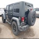 1J4HA3H15AL124726 2010 Jeep Wrangler Unlimited Sport auction photo thumbnail 3