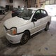 KNADC125036245189 2003 Kia Rio auction photo thumbnail 2