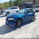 1FAFP4041YF108979 2000 Ford Mustang auction photo thumbnail 2