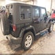 1J4BA5H15AL207882 2010 Jeep Wrangler Unlimited Sahara auction photo thumbnail 4