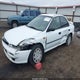 JF1GC4354YH505031 2000 Subaru Impreza L auction photo thumbnail 2