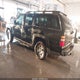 3GNFK16TX4G233260 2004 Chevrolet Suburban 1500 Z71 auction photo thumbnail 3
