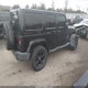 1C4HJWEG0EL128348 2014 Jeep Wrangler Unlimited Sahara auction photo thumbnail 4