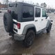 1C4HJWDG5GL169823 2016 Jeep Wrangler Unlimited Willys Wheeler auction photo thumbnail 4