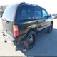1GNEK13Z62R281839 2002 Chevrolet Tahoe Lt auction photo thumbnail 4