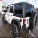 1C4BJWDG6GL309948 2016 Jeep Wrangler Unlimited Sport auction photo thumbnail 5