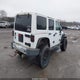1J4HA5H10BL602015 2011 Jeep Wrangler Unlimited Sahara auction photo thumbnail 4