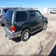 1FMZU73E1YZA41414 2000 Ford Explorer Xlt auction photo thumbnail 4