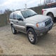 1J4GW48S3YC264165 2000 Jeep Grand Cherokee Laredo auction photo thumbnail 1