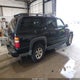 3GNFK16Z13G281409 2003 Chevrolet Suburban 1500 Z71 auction photo thumbnail 4