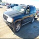 1J8GW68J42C290993 2002 Jeep Grand Cherokee Overland auction photo thumbnail 2