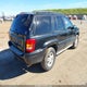 1J8GW68J42C290993 2002 Jeep Grand Cherokee Overland auction photo thumbnail 4