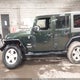 1J4BA5H15AL225685 2010 Jeep Wrangler Unlimited Sahara auction photo thumbnail 14