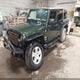 1J4BA5H15AL225685 2010 Jeep Wrangler Unlimited Sahara auction photo thumbnail 2