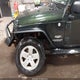 1J4BA5H15AL225685 2010 Jeep Wrangler Unlimited Sahara auction photo thumbnail 6