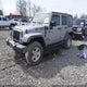 1C4HJWDG3EL126823 2014 Jeep Wrangler Unlimited Sport auction photo thumbnail 2