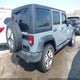 1C4BJWDG2FL588247 2015 Jeep Wrangler Unlimited Sport auction photo thumbnail 4