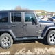 1C4HJWEG0GL147517 2016 Jeep Wrangler Unlimited Sahara auction photo thumbnail 14