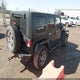 1J4BA5H14AL123374 2010 Jeep Wrangler Unlimited Sahara auction photo thumbnail 4