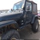 1J4FA59S04P703873 2004 Jeep Wrangler Sahara auction photo thumbnail 6