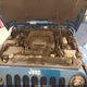 1C4BJWEG4FL580956 2015 Jeep Wrangler Unlimited Sahara auction photo thumbnail 10