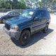 1J4GX48N34C412705 2004 Jeep Grand Cherokee Laredo auction photo thumbnail 2