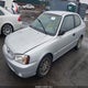 KMHCG35C51U140323 2001 Hyundai Accent Gs auction photo thumbnail 2