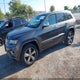 1C4RJFCG3EC380778 2014 Jeep Grand Cherokee Overland auction photo thumbnail 2