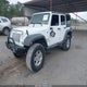 1C4BJWDG5EL307802 2014 Jeep Wrangler Unlimited Sport auction photo thumbnail 2