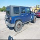 1J4HA5H17AL108569 2010 Jeep Wrangler Unlimited Sahara auction photo thumbnail 4