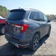 5FNYF6H65KB036994 2019 Honda Pilot Touring auction photo thumbnail 4