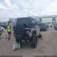 1J4BA3H17BL625284 2011 Jeep Wrangler Unlimited Sport auction photo thumbnail 4