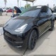7SAYGDEE2PA105239 2023 Tesla Model Y Awd/Long Range Dual Motor All-Wheel Drive auction photo thumbnail 2