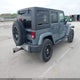 1C4BJWEG8EL213847 2014 Jeep Wrangler Unlimited Sahara auction photo thumbnail 4