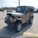 1J4FA59S03P376650 2003 Jeep Sahara Tj auction photo thumbnail 2