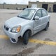KNADH4B32B6859015 2011 Kia Rio Ex auction photo thumbnail 2
