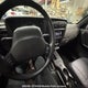 1J4FF68S7XL622017 1999 Jeep Cherokee Sport auction photo thumbnail 5