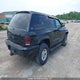 1B4HS28Z2XF666776 1999 Dodge Durango Slt auction photo thumbnail 4